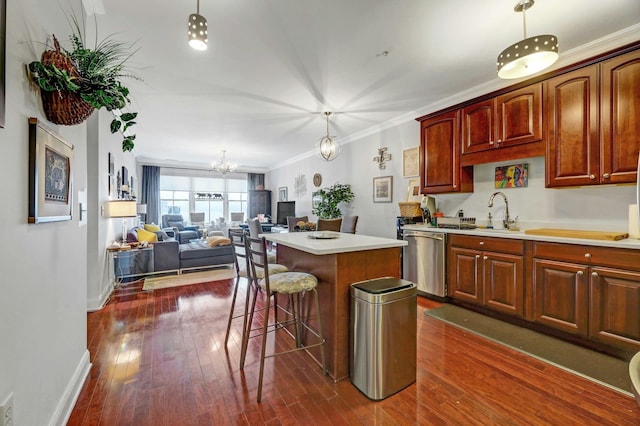 20 Avenue At Port Imperial Unit 425, West New York, NJ 07093 - kitchen featuring dishwasher, a center island, a chandelier, dark wood-type flooring, and a breakfast bar