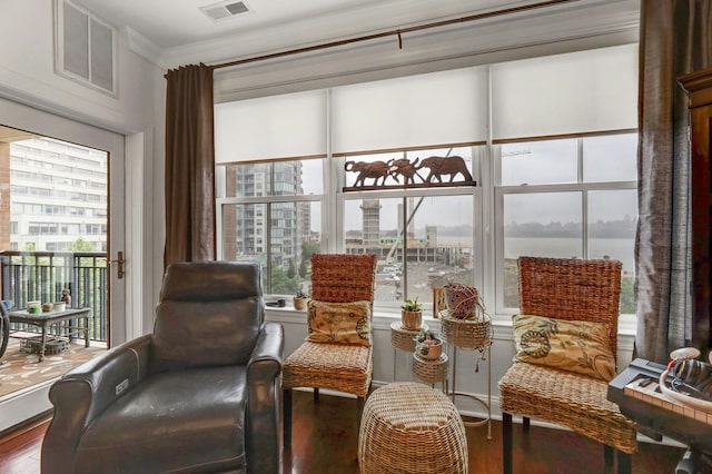 20 Avenue At Port Imperial Unit 425, West New York, NJ 07093 - living area with wood finished floors, ornamental molding, and plenty of natural light