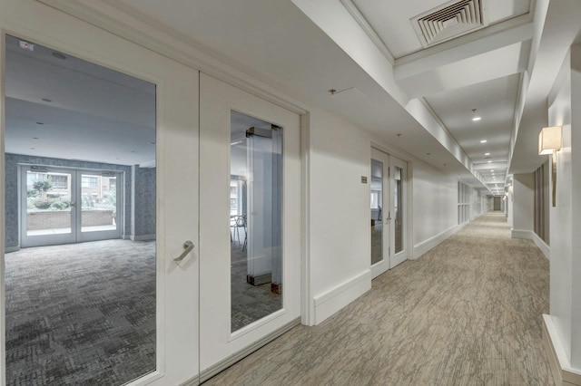 20 Avenue At Port Imperial Unit 425, West New York, NJ 07093 - hallway with french doors, carpet, and wood finished floors