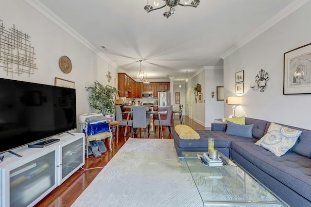 20 Avenue At Port Imperial Unit 425, West New York, NJ 07093 - living room featuring a chandelier, dark wood-type flooring, and ornamental molding