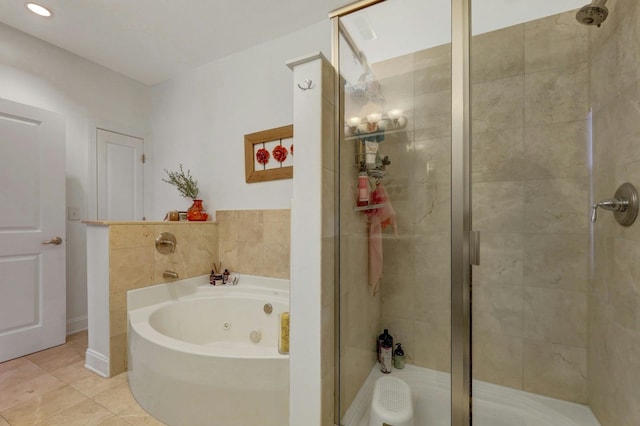 20 Avenue At Port Imperial Unit 425, West New York, NJ 07093 - bathroom featuring a stall shower, a whirlpool tub, and tile patterned flooring