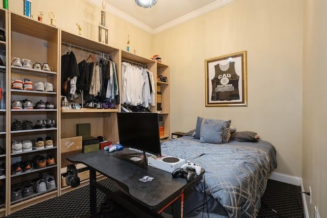 bedroom featuring ornamental molding, carpet flooring, baseboards, and an office area