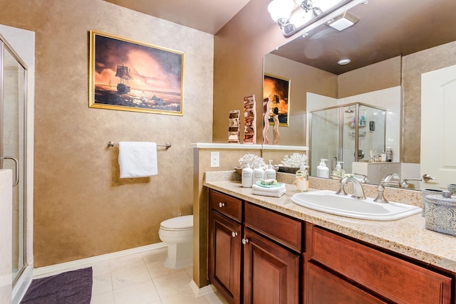 bathroom with toilet, vanity, tile patterned flooring, and walk in shower