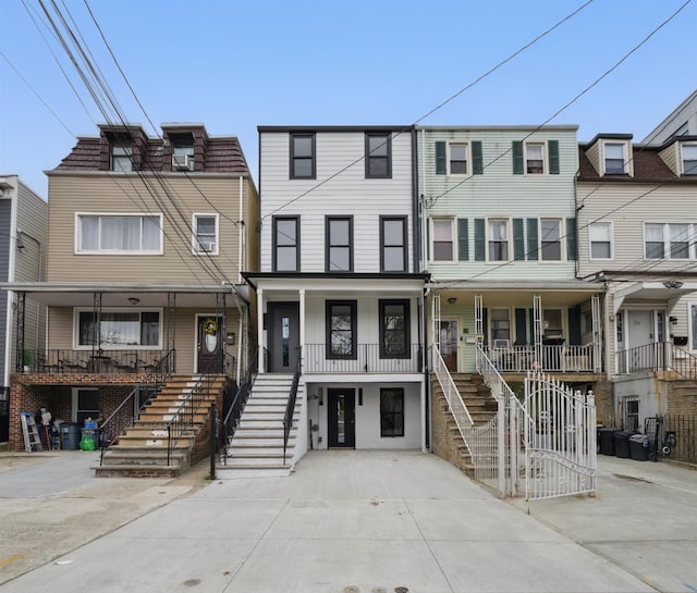 63 Jefferson Ave Unit 2, Jersey City, NJ 07307 - view of property featuring stairway and covered porch