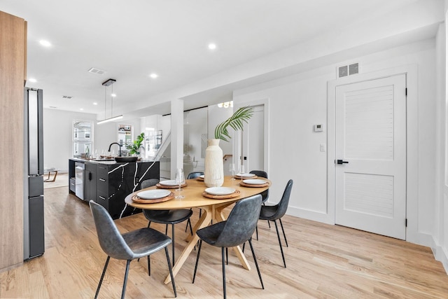 63 Jefferson Ave Unit 2, Jersey City, NJ 07307 - dining space featuring light wood-style flooring, baseboards, and recessed lighting