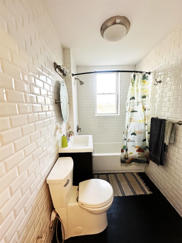 bathroom featuring toilet, vanity, and shower / bathtub combination with curtain