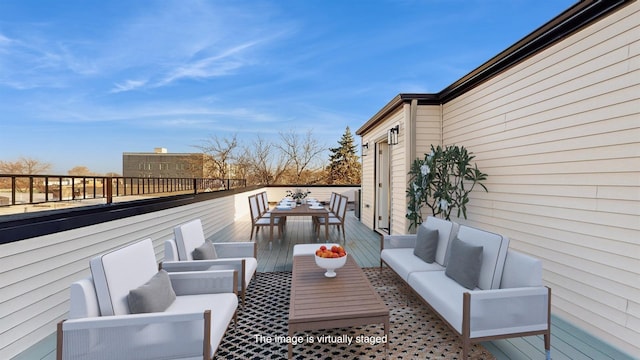 wooden deck featuring outdoor lounge area