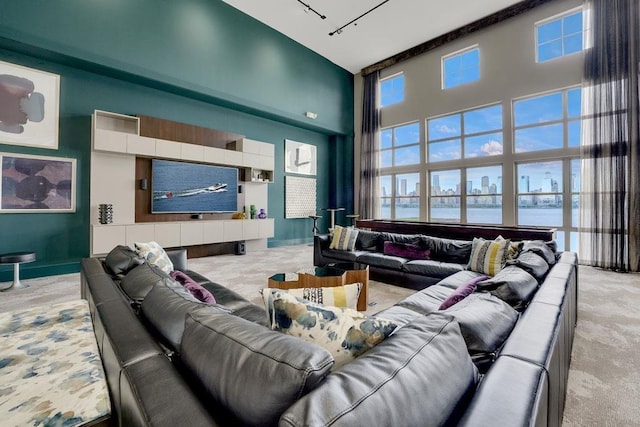 26 Ave At Port Imperial Unit 440, West New York, NJ 07093 - carpeted living room with a towering ceiling