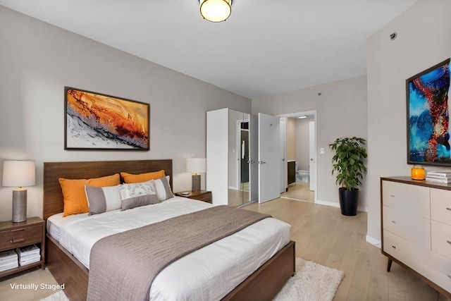 26 Ave At Port Imperial Unit 440, West New York, NJ 07093 - bedroom featuring light wood-style floors and baseboards