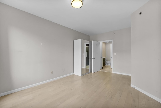 26 Ave At Port Imperial Unit 440, West New York, NJ 07093 - unfurnished room featuring baseboards and light wood-type flooring