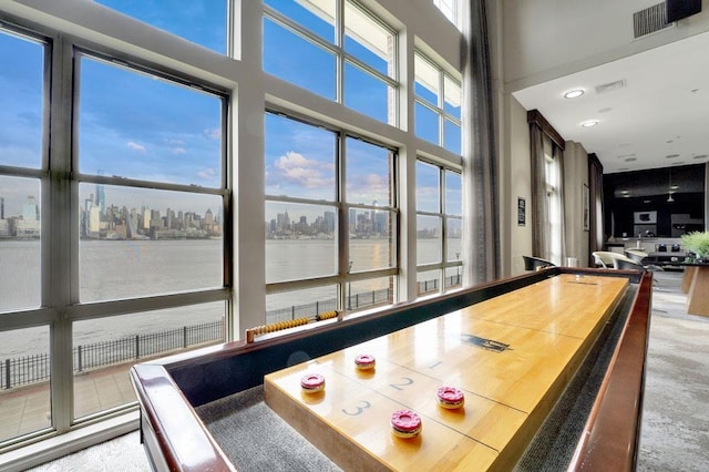 26 Ave At Port Imperial Unit 440, West New York, NJ 07093 - playroom featuring a water view, a city view, and a towering ceiling