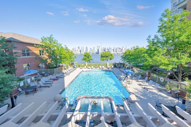 26 Ave At Port Imperial Unit 440, West New York, NJ 07093 - community pool featuring a patio area and a water view