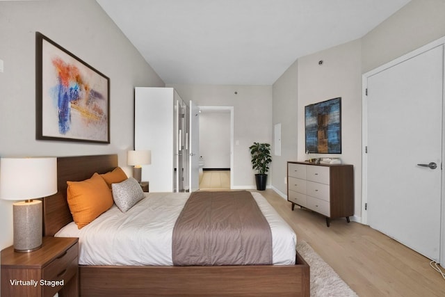 26 Ave At Port Imperial Unit 440, West New York, NJ 07093 - bedroom with light wood finished floors and french doors