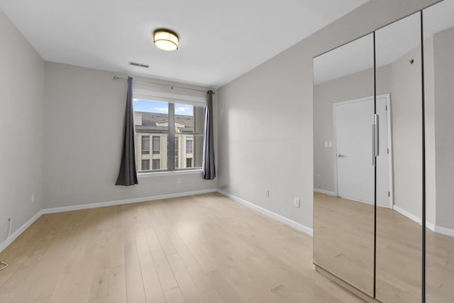 26 Ave At Port Imperial Unit 440, West New York, NJ 07093 - unfurnished bedroom featuring light wood-style flooring