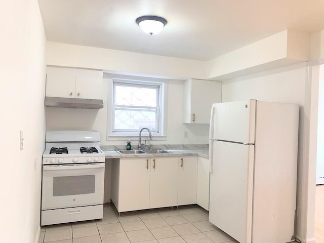 1518 38th St, North Bergen, NJ 07047 - kitchen with white appliances, a sink, under cabinet range hood, light countertops, and white cabinets