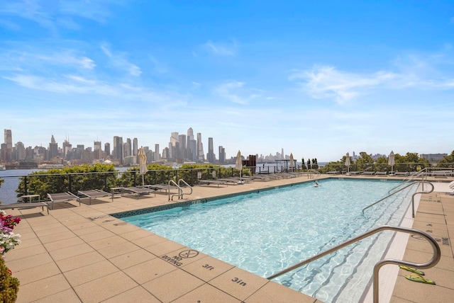 view of pool featuring a patio