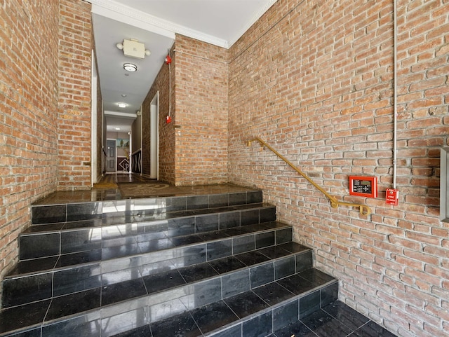 77 Crescent Ave Unit 8, Jersey City, NJ 07304 - staircase with brick wall and crown molding