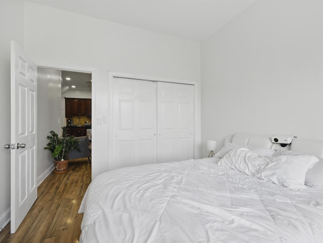 77 Crescent Ave Unit 8, Jersey City, NJ 07304 - bedroom featuring wood finished floors, a closet, and baseboards