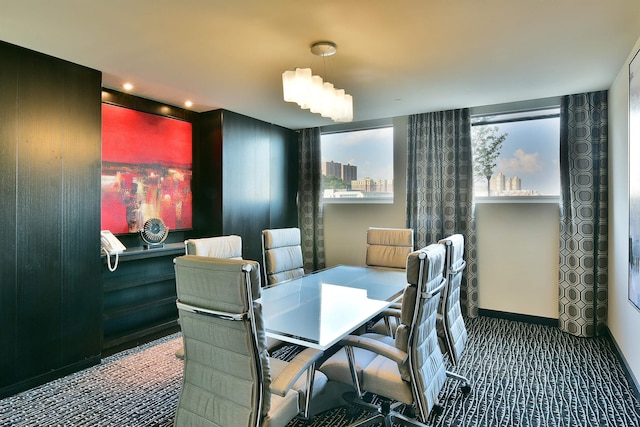 dining area featuring baseboards