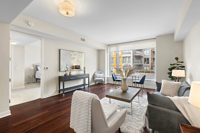 living room featuring dark hardwood / wood-style floors