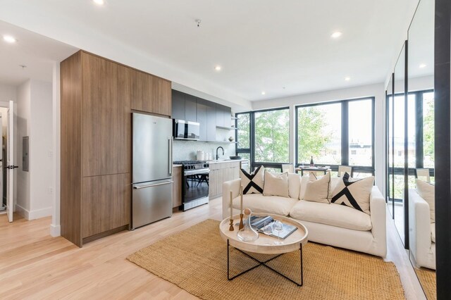 433 Central Ave Unit 3A, Jersey City, NJ 07307 - living area with recessed lighting and light wood finished floors