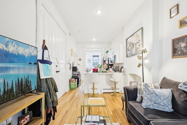 300 Barrow St, Jersey City, NJ 07302 - interior space with recessed lighting, light wood-type flooring, and a baseboard heating unit