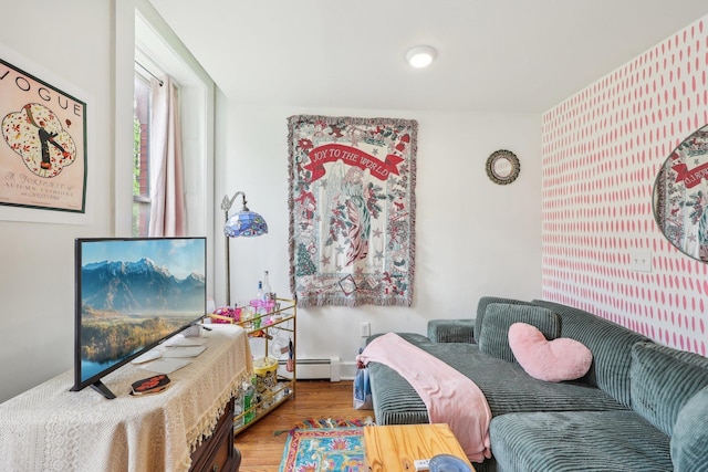 300 Barrow St, Jersey City, NJ 07302 - living area with baseboards, baseboard heating, and wood finished floors