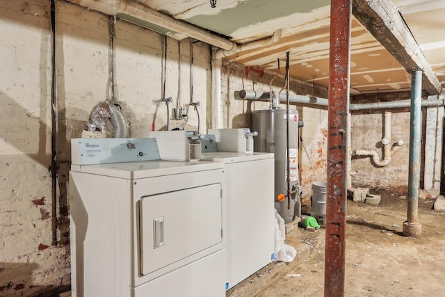 300 Barrow St, Jersey City, NJ 07302 - washroom with laundry area, washer and dryer, and water heater