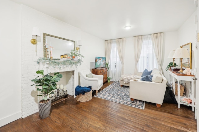 300 Barrow St, Jersey City, NJ 07302 - sitting room with baseboards and wood finished floors