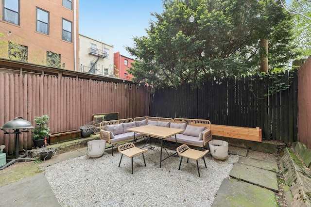 300 Barrow St, Jersey City, NJ 07302 - view of patio with a fenced backyard and outdoor lounge area