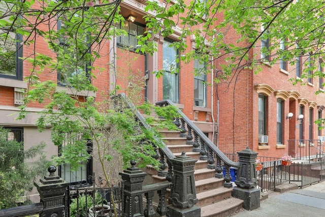 300 Barrow St, Jersey City, NJ 07302 - view of building exterior with fence and stairs