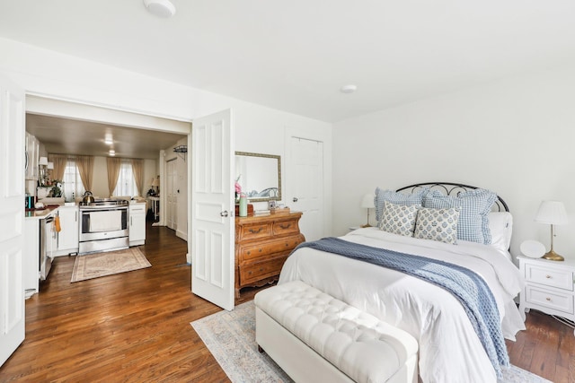 300 Barrow St, Jersey City, NJ 07302 - bedroom with dark wood-type flooring