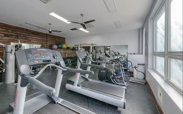 workout area featuring a ceiling fan