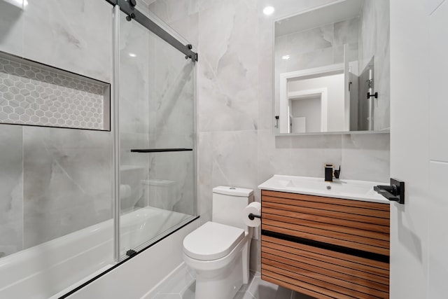313 Lembeck Ave Unit 1, Jersey City, NJ 07305 - bathroom featuring enclosed tub / shower combo, tile walls, and vanity