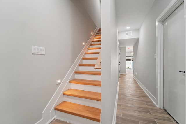 313 Lembeck Ave Unit 1, Jersey City, NJ 07305 - staircase featuring wood finished floors and recessed lighting