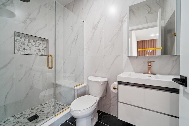 313 Lembeck Ave Unit 1, Jersey City, NJ 07305 - bathroom featuring tile walls, a marble finish shower, and vanity