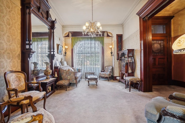 sitting room featuring a notable chandelier, ornamental molding, and carpet floors