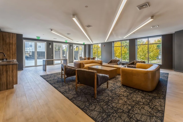 community lobby with a sink and visible vents