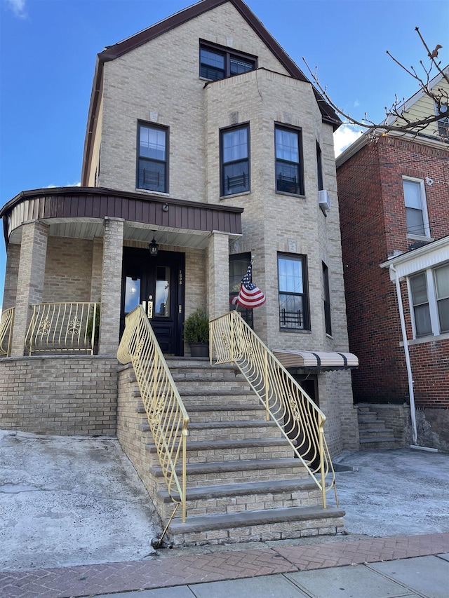 view of front of home featuring covered porch