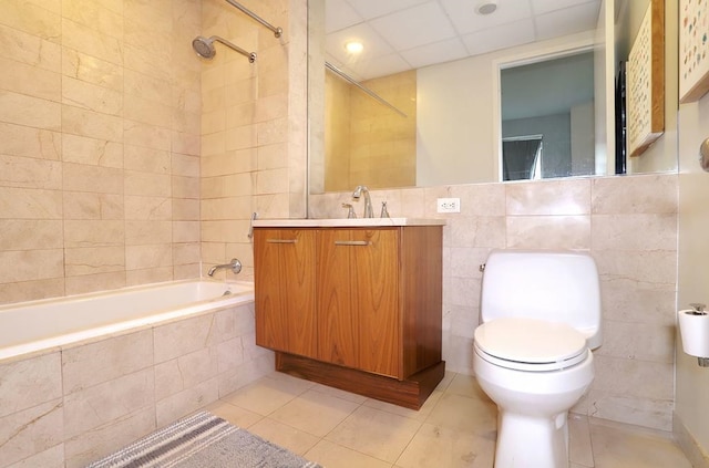 4 Beacon Way Unit 1110, Jersey City, NJ 07304 - full bathroom featuring tile walls, tile patterned floors, tiled shower / bath, toilet, and vanity
