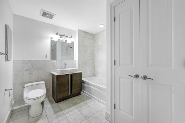 full bathroom with vanity, visible vents, tile patterned flooring, tile walls, and toilet