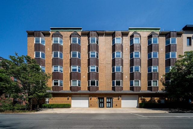 721 Madison St Unit 4N, Hoboken, NJ 07030 - view of apartment building / complex featuring an attached garage