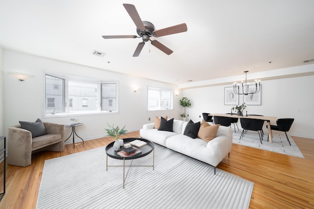 721 Madison St Unit 4N, Hoboken, NJ 07030 - living room featuring a chandelier, light wood finished floors, and ceiling fan