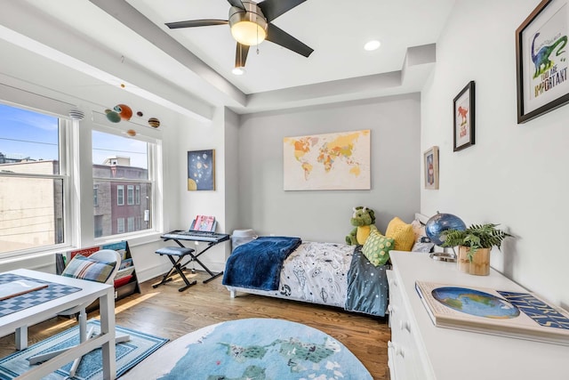 123 Jackson St Unit 4A, Hoboken, NJ 07030 - bedroom with wood finished floors, a ceiling fan, and a raised ceiling