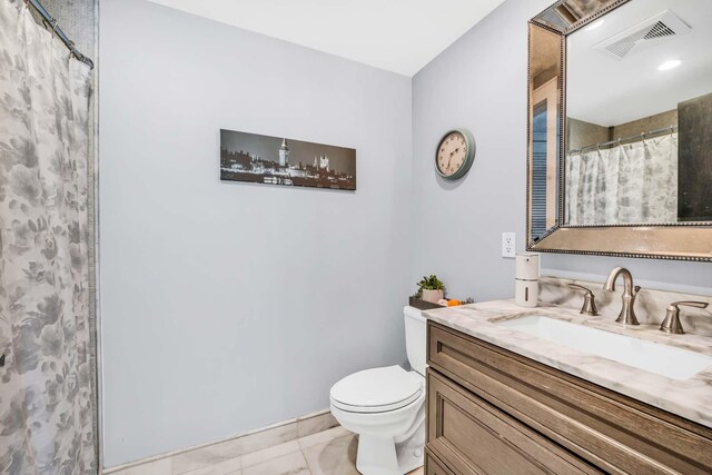 123 Jackson St Unit 4A, Hoboken, NJ 07030 - bathroom with toilet and vanity