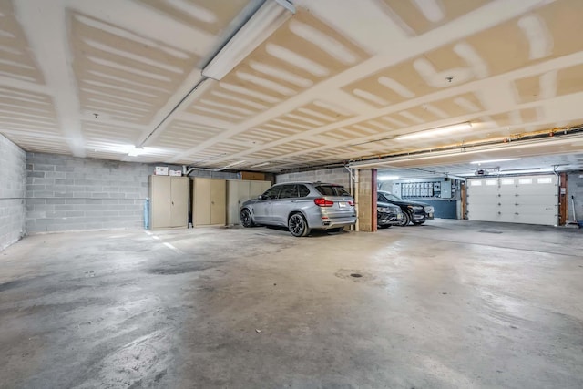 123 Jackson St Unit 4A, Hoboken, NJ 07030 - parking deck featuring concrete block wall