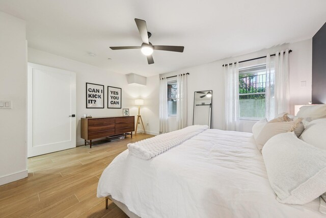 243 3rd St Unit 1, Jersey City, NJ 07302 - bedroom featuring light wood-type flooring and a ceiling fan
