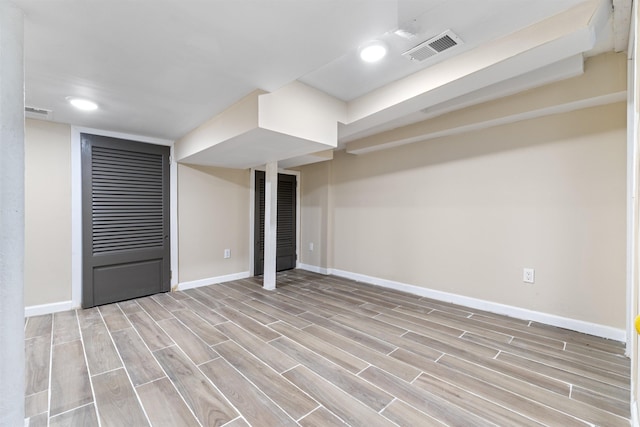 99 W 50th St, Bayonne, NJ 07002 - finished basement with baseboards, light wood-type flooring, and recessed lighting