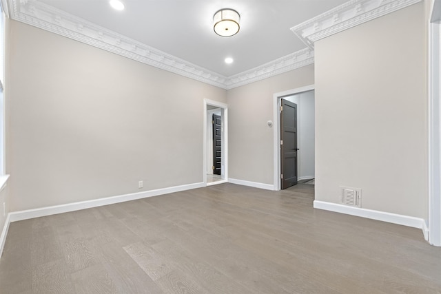 99 W 50th St, Bayonne, NJ 07002 - unfurnished room featuring crown molding, baseboards, wood finished floors, and recessed lighting