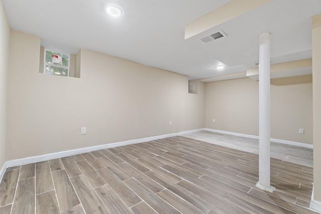 99 W 50th St, Bayonne, NJ 07002 - finished below grade area featuring wood finished floors and baseboards